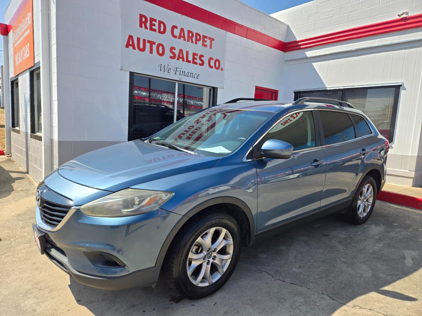 2014 Blue Mazda CX-9 Sport (JM3TB2BA0E0) with an 3.7L V6 DOHC 24V engine, 6-Speed Automatic transmission, located at 503 West Court, Seguin, TX, 78155, (830) 379-3373, 29.568621, -97.969803 - Photo#0